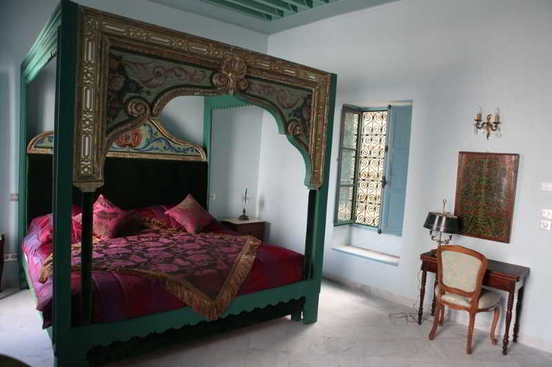 Palais Bayram Otel Tunus Dış mekan fotoğraf A bedroom in the Riad